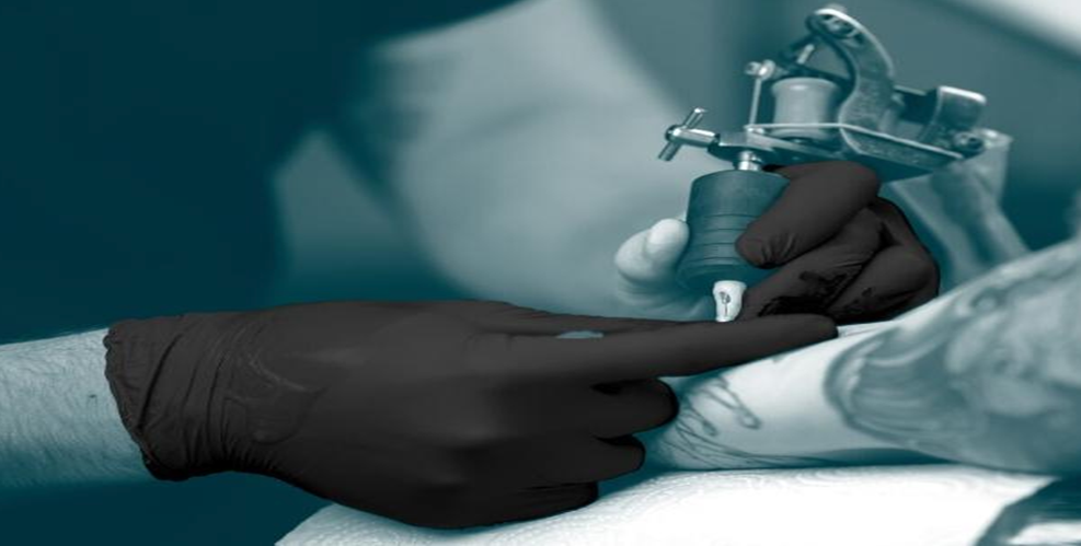 Black Latex-Free Nitrile Exam Gloves Used During Tattooing